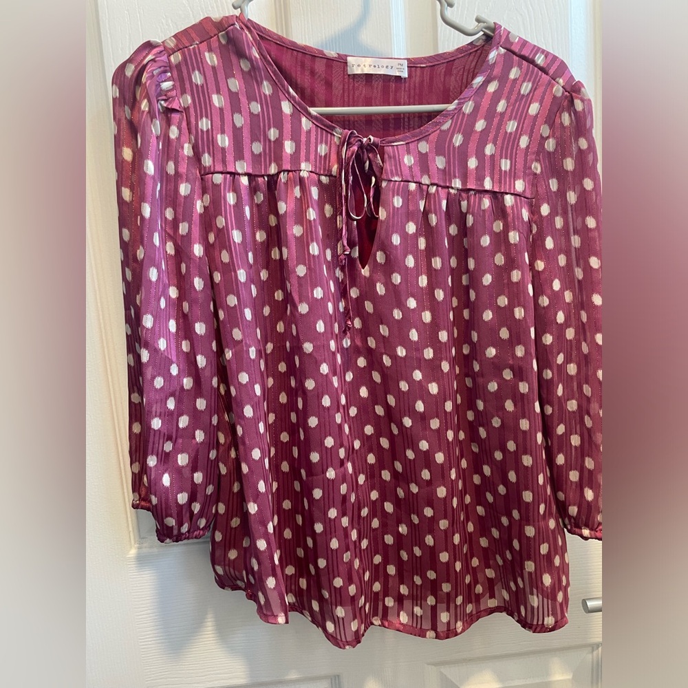 Polka dots pink dress shirt.